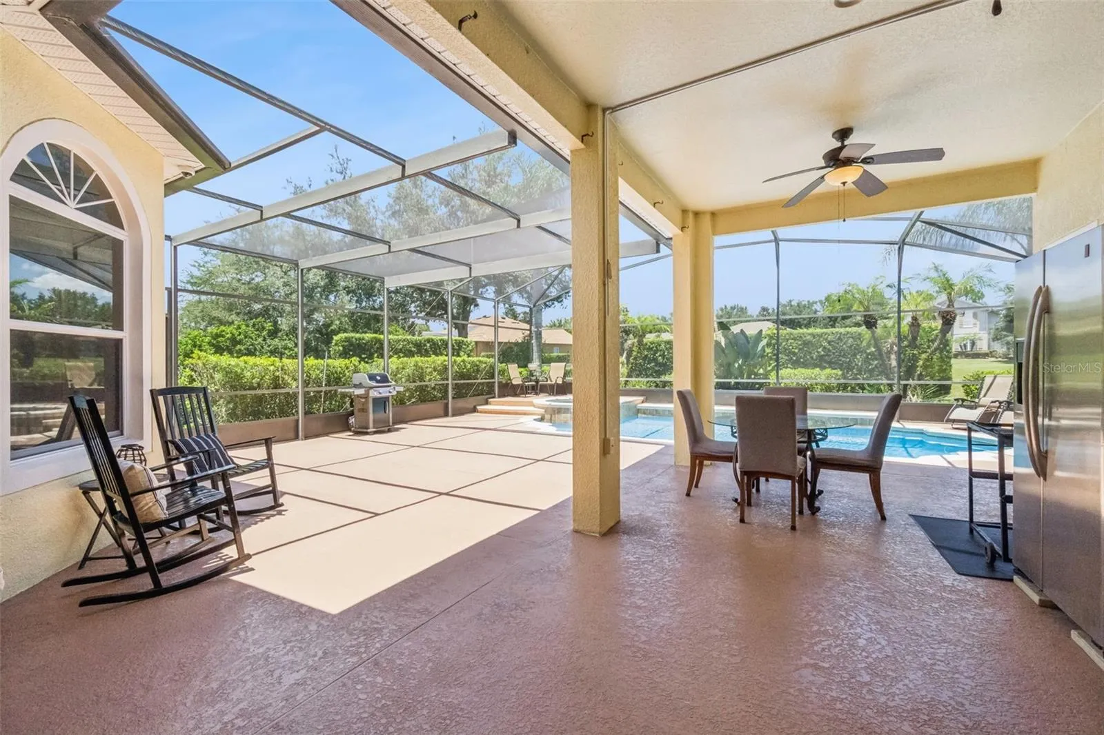 Covered lanai overlooking the screened pool