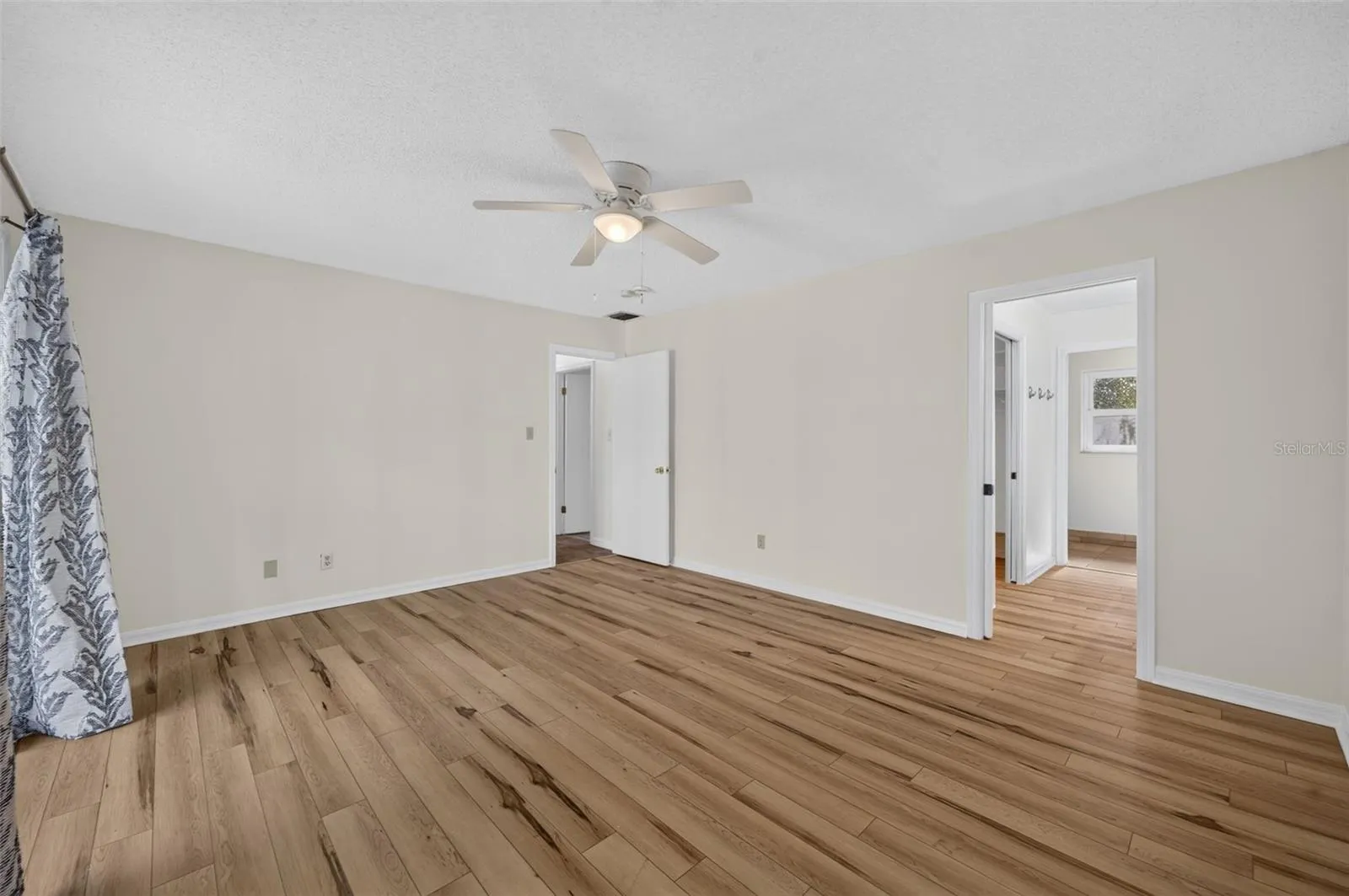 Primary with view of bath and closet