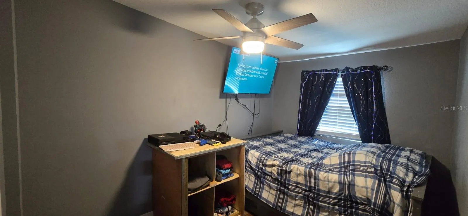 On opposing side of the house is the guest bedroom.