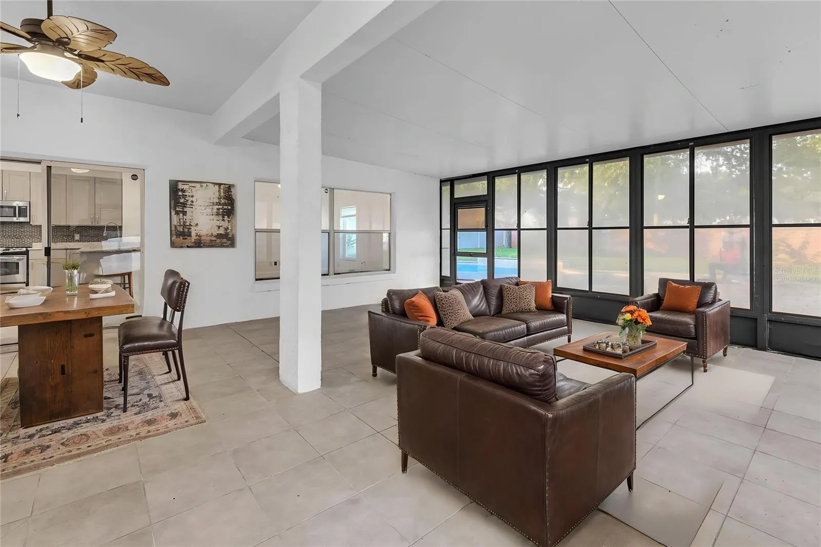 Virtually StagedEnclosed Florida RoomOption for Outside Entertainment