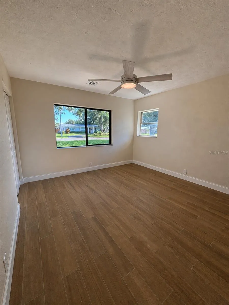 Empty Corner Bedroom