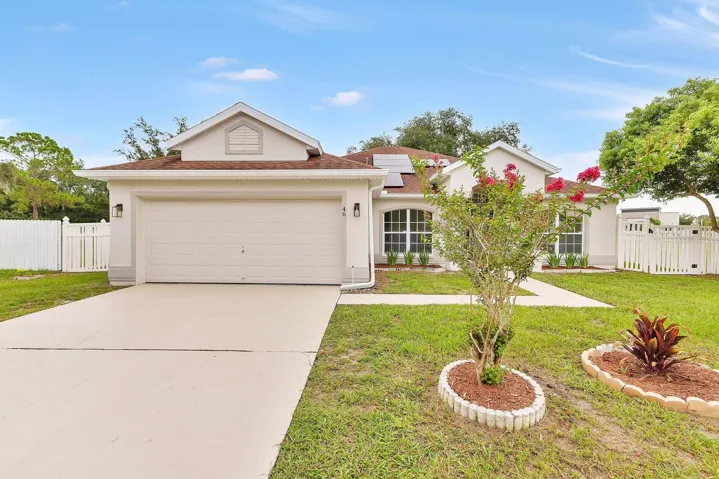 Front of house with privacy fence