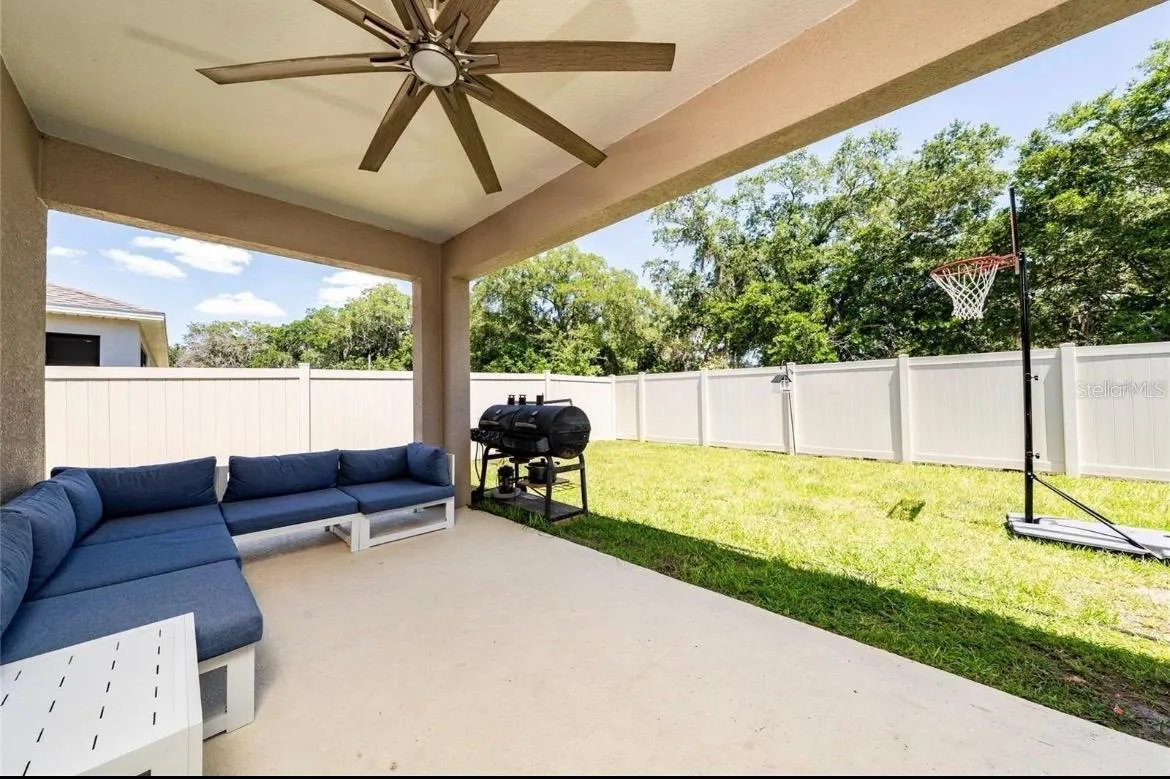 Lanai with fully fenced backyard