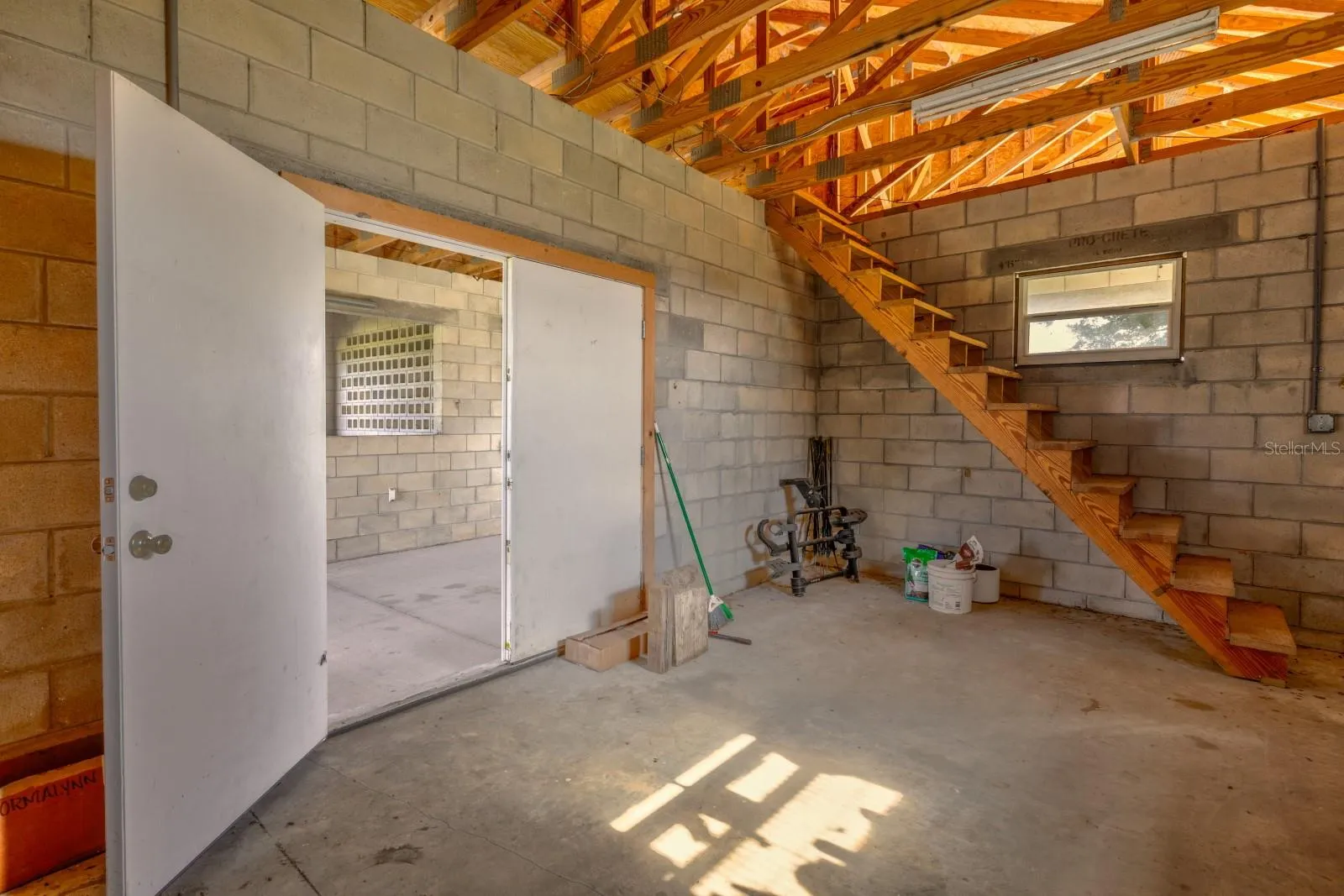 Barn office with stairs to 2nd Floor, approx 13'X19'