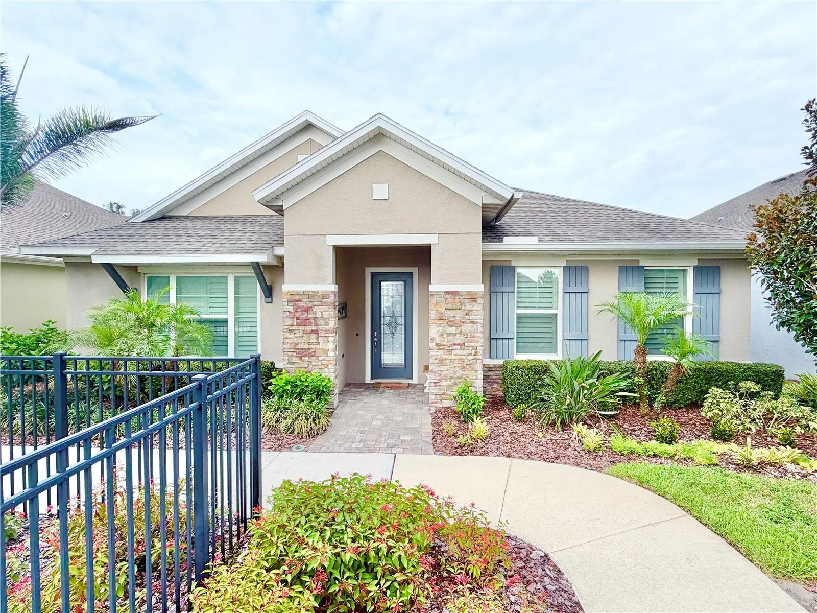 Former David Weekley model and has upgrades galore!  The exterior color tones are light brown and blue, making it feel modern and rustic.  Roof is 2018.