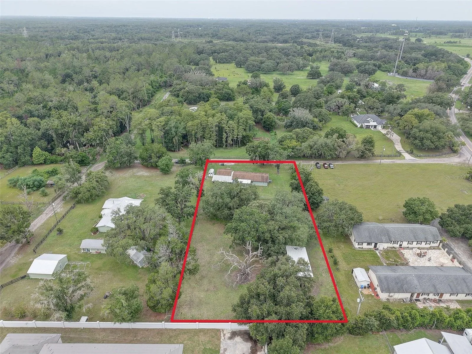 Spacious 1.15 Acre Fenced Lot