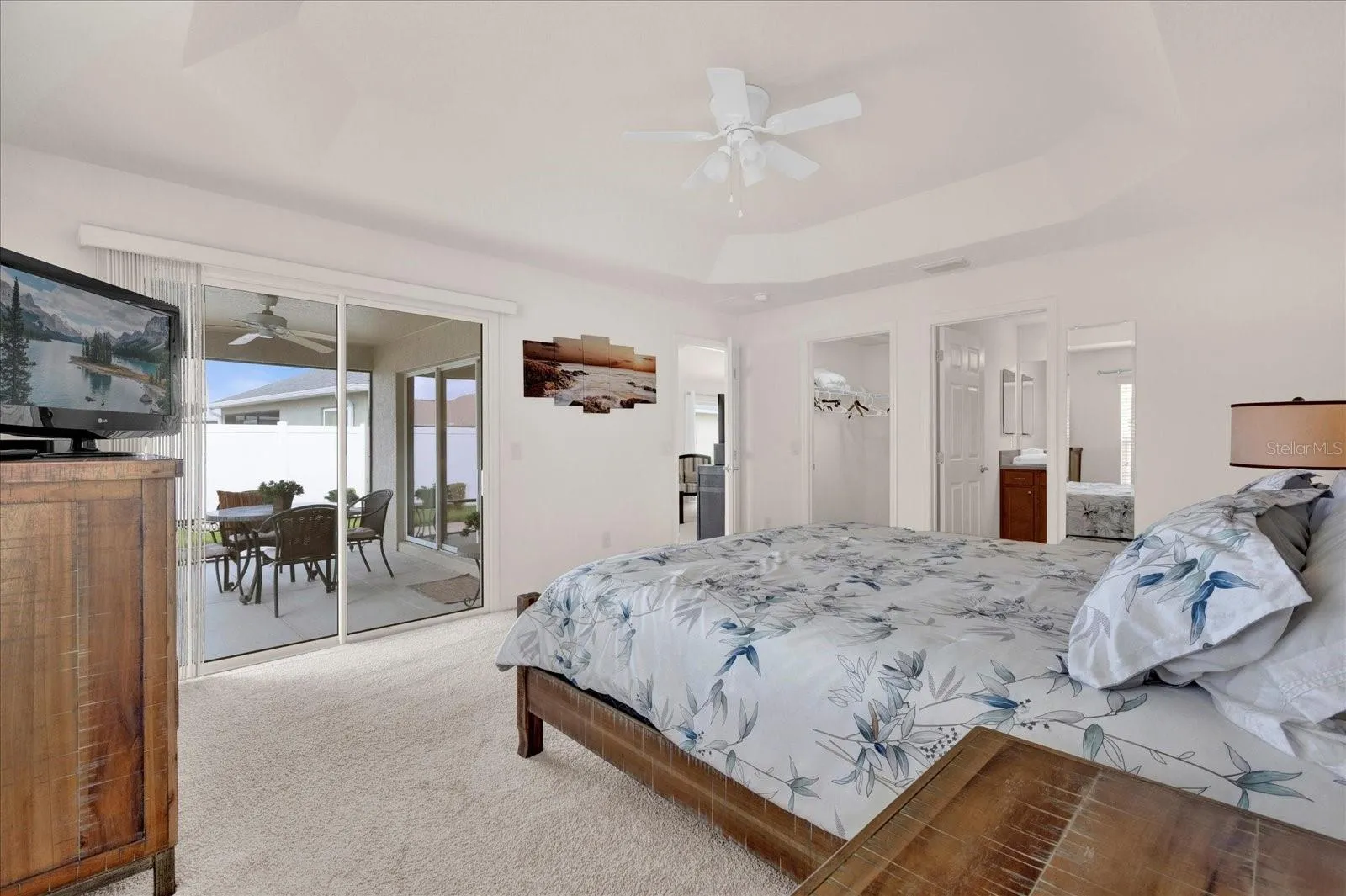 MASTER BEDROOM WITH SLIDING GLASS DOORS TO LANAI