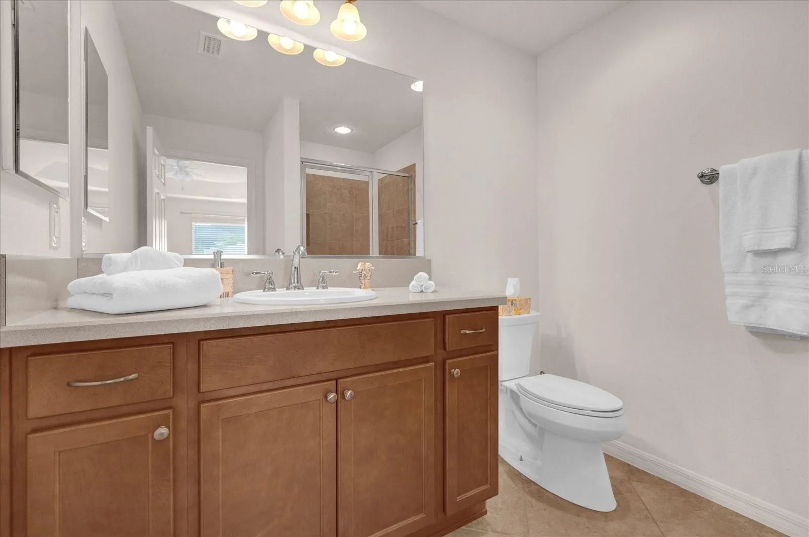 MASTER BATHROOM WITH TILE FLOOR