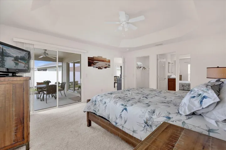 MASTER BEDROOM WITH SLIDING GLASS DOORS TO LANAI