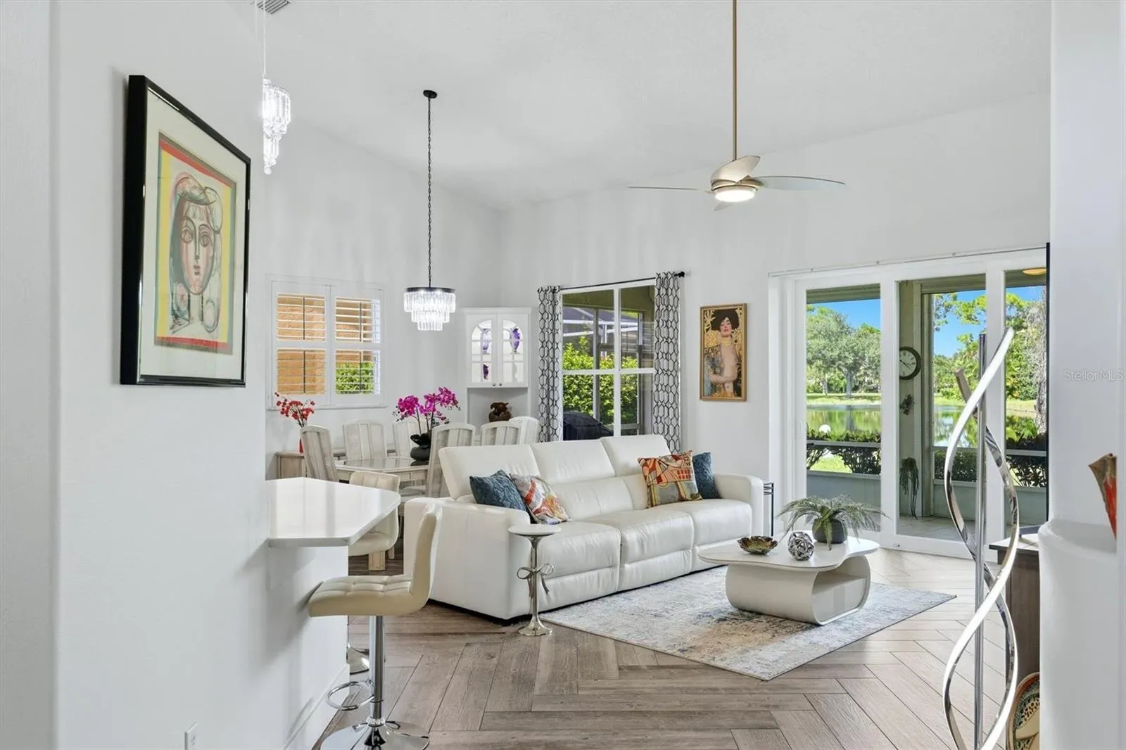 Living room, dining room and lanai.