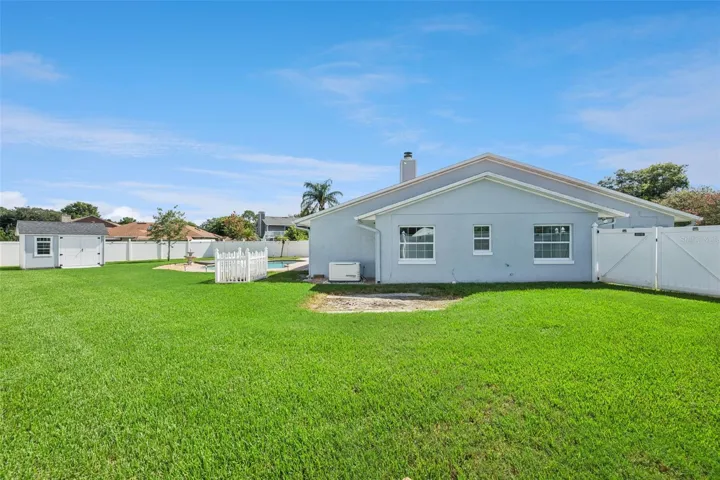 Backyard Oasis with Pool/Storage Shed and Fenced-In Backyard