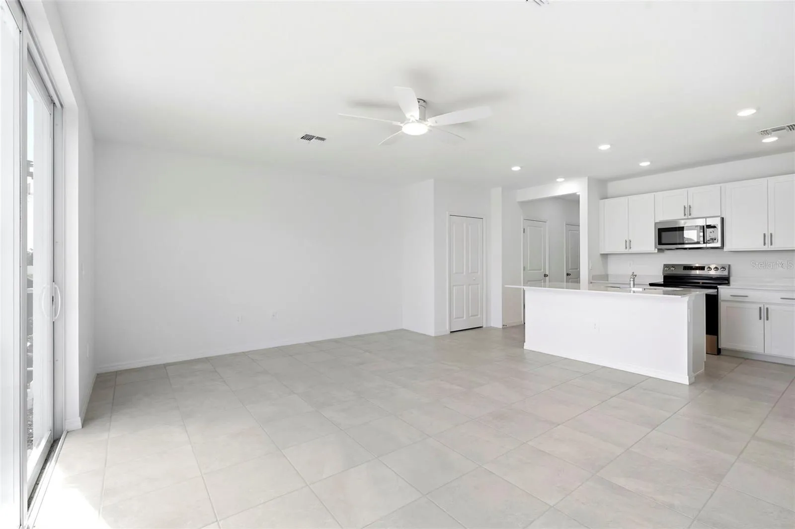 view of the living area and kitchen - a lot of space