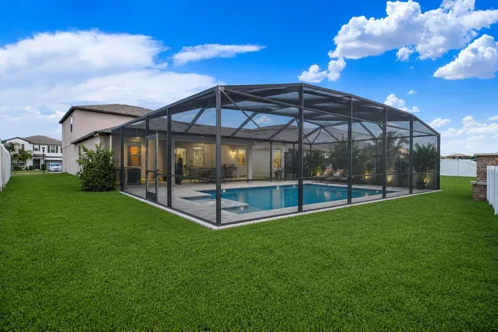 Backyard Pool Lanai Retreat - Virtually Staged