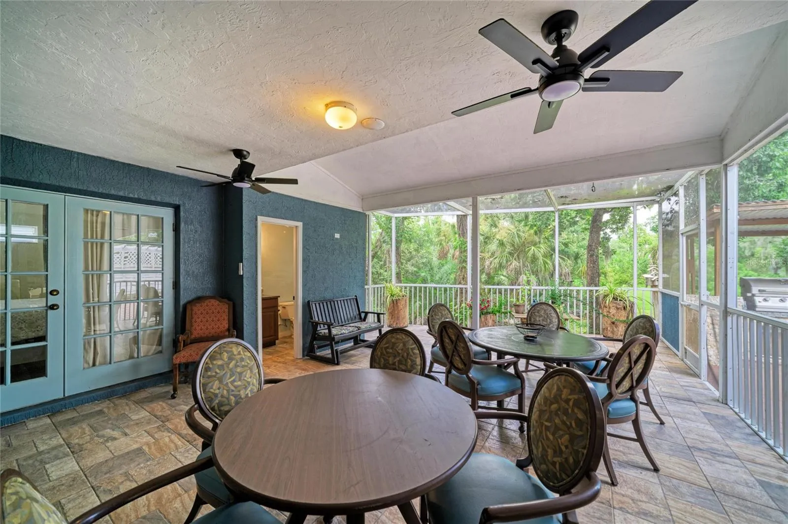 Screened Lanai just off of Dining area and Family room.