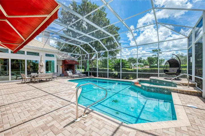 Heated saltwater pool and spa, solar and gas heated. Awning is retractable.