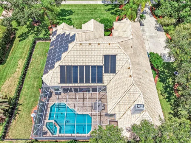 Overhead - fenced dog run on the left, and solar panels power the home, energy stored in Tesla Powerwall