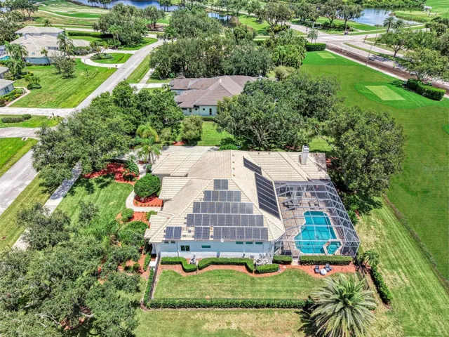 Overhead - fenced dog run, and solar panels power the home, energy stored in Tesla Powerwall