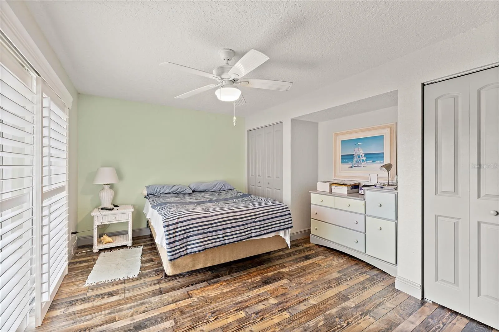 Primary Bedroom with Wood Floors