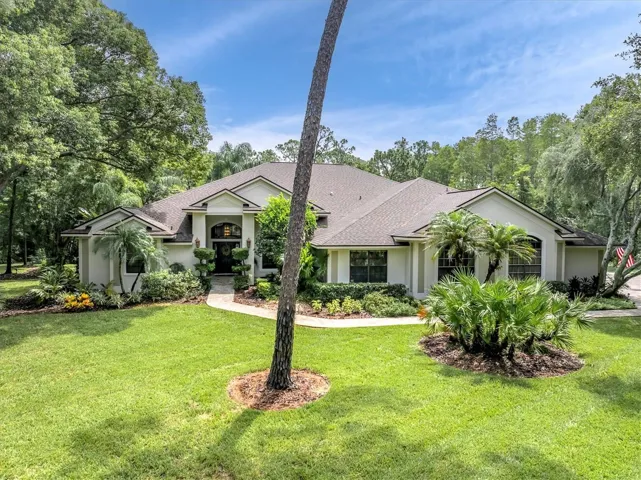WELCOME HOME TO THIS LUXURIOUS ESTATE HOME ON 1.22 ACRE