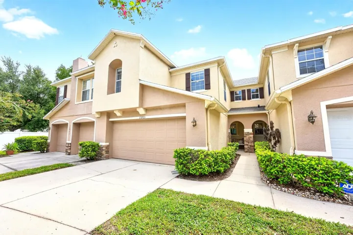 Welcome to this beautifully updated 3-bedroom, 2.5-bath townhome with a 2-CAR GARAGE in the GATED Orchard community of Winter Garden!
