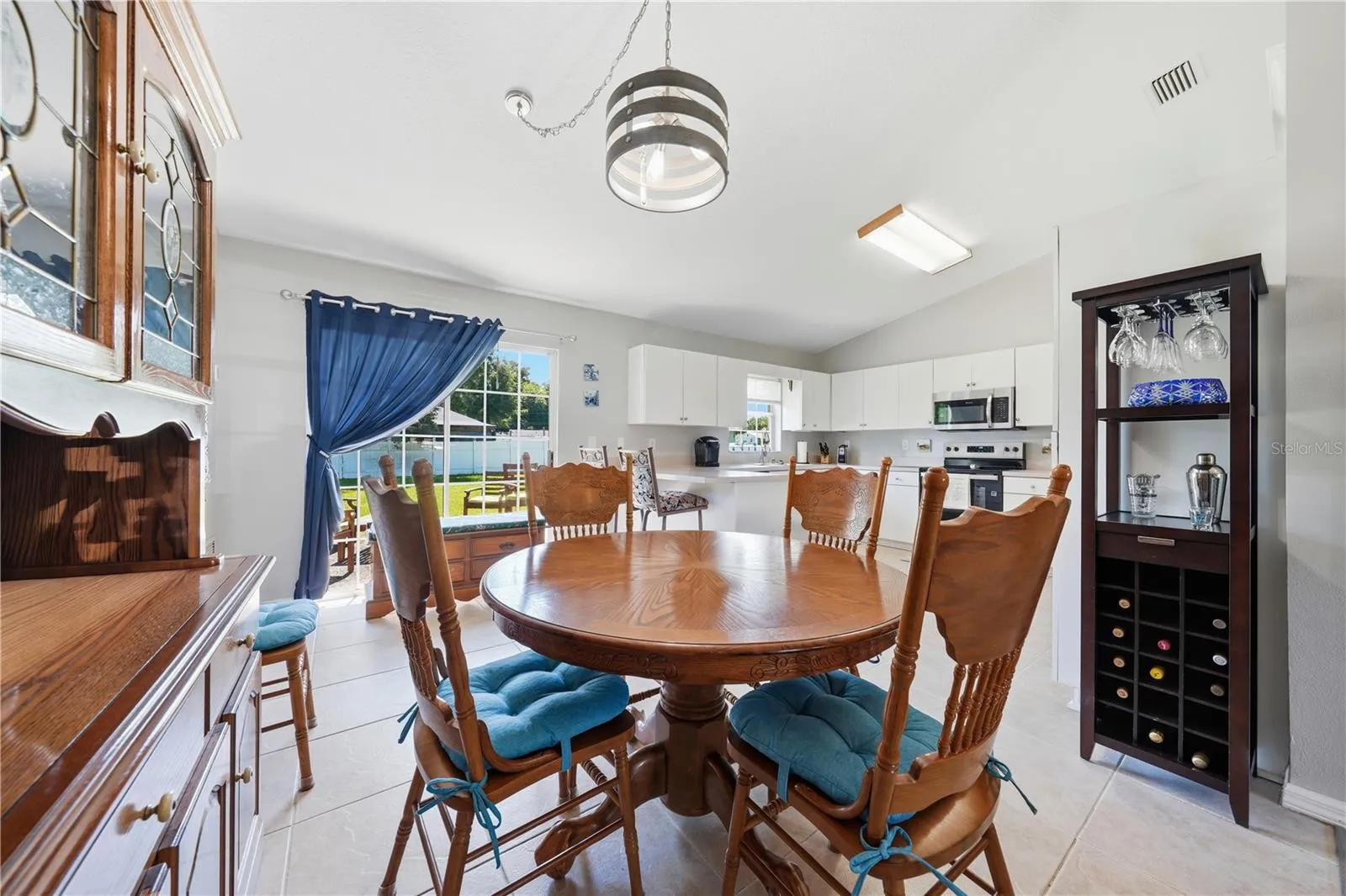 Dining Room with view into the kitchen and backyard