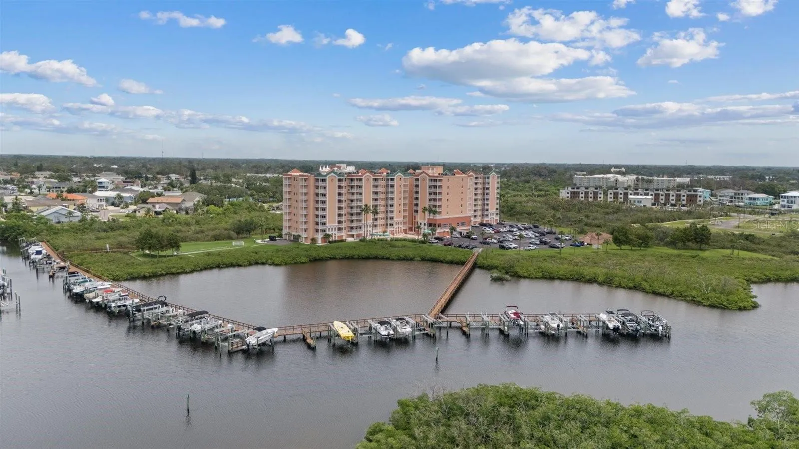 8th floor condo with Boat lift/slip #25-Aerial view of Marina looking north towards complex