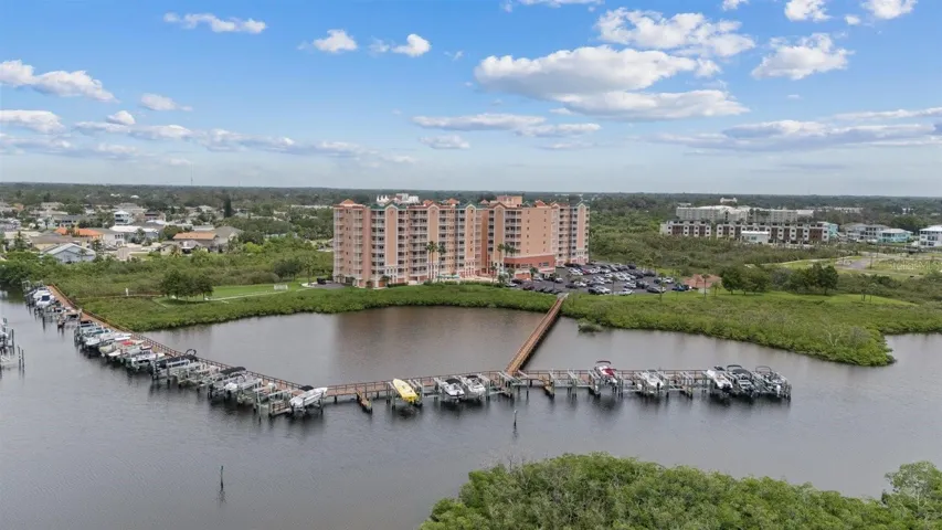 8th floor condo with Boat lift/slip #25-Aerial view of Marina looking north towards complex