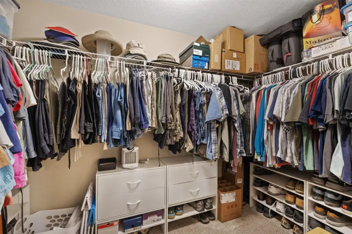 Large walk in closet for primary.