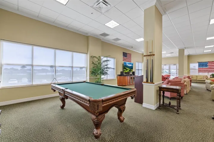 2nd floor Club room with seating and pool table