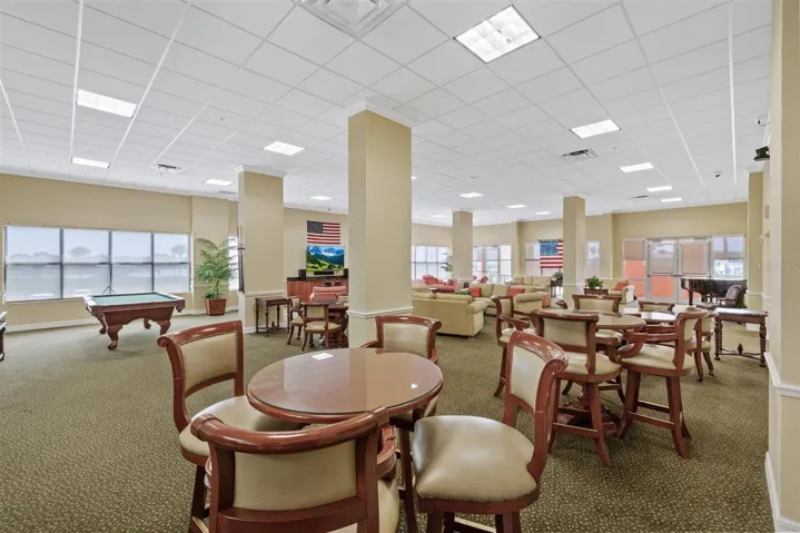 2nd Floor- Club room with pool table and piano