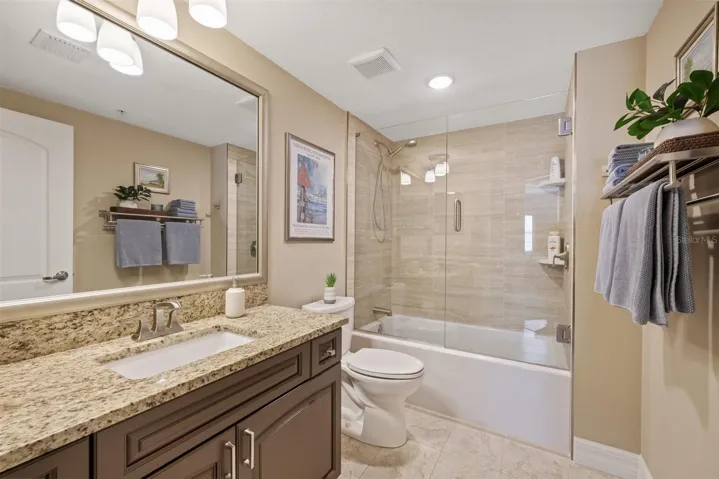Bathroom 2-New tub and shower with glass enclosure/door