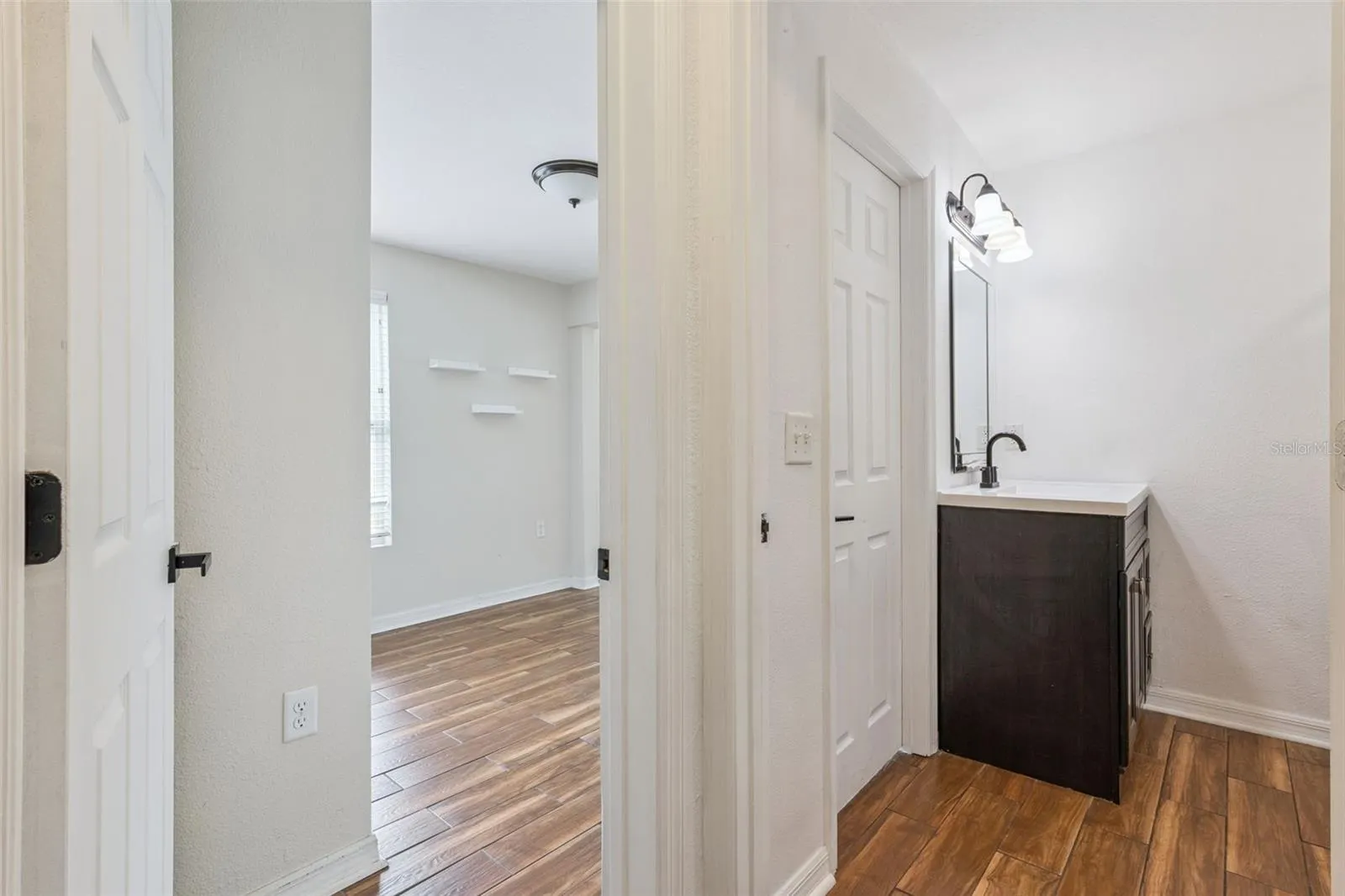 Entryway to Primary Bedroom &amp; Bathroom