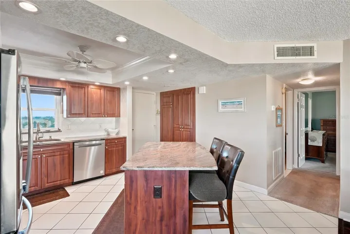 The kitchen overlooks the living area.