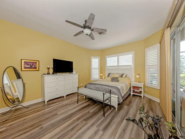 LARGE PRIMARY BEDROOM, OPENS ONTO LANAI AND POOL
