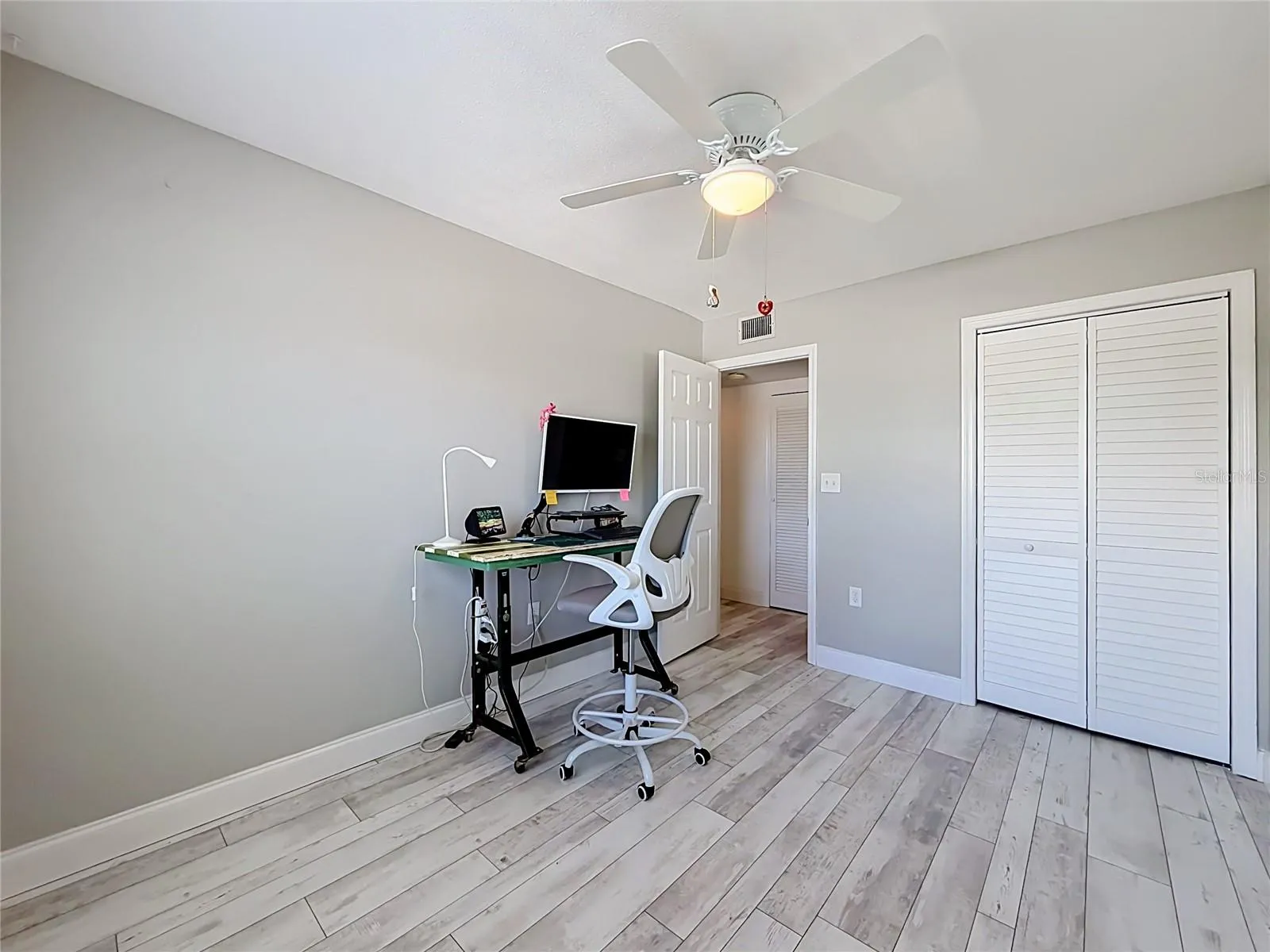 The front left bedroom is currrently a work from home space