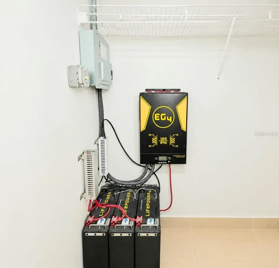 Backup power system with 3 batteries/inverter