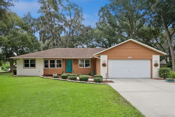 Welcome home to 480 Lake Forest Cir, a 3-bedroom, 2-bath home with 2-car attached garage on a 0.46-acre cul-de-sac lot in Mount Dora's Lake Forest community, FL 32757