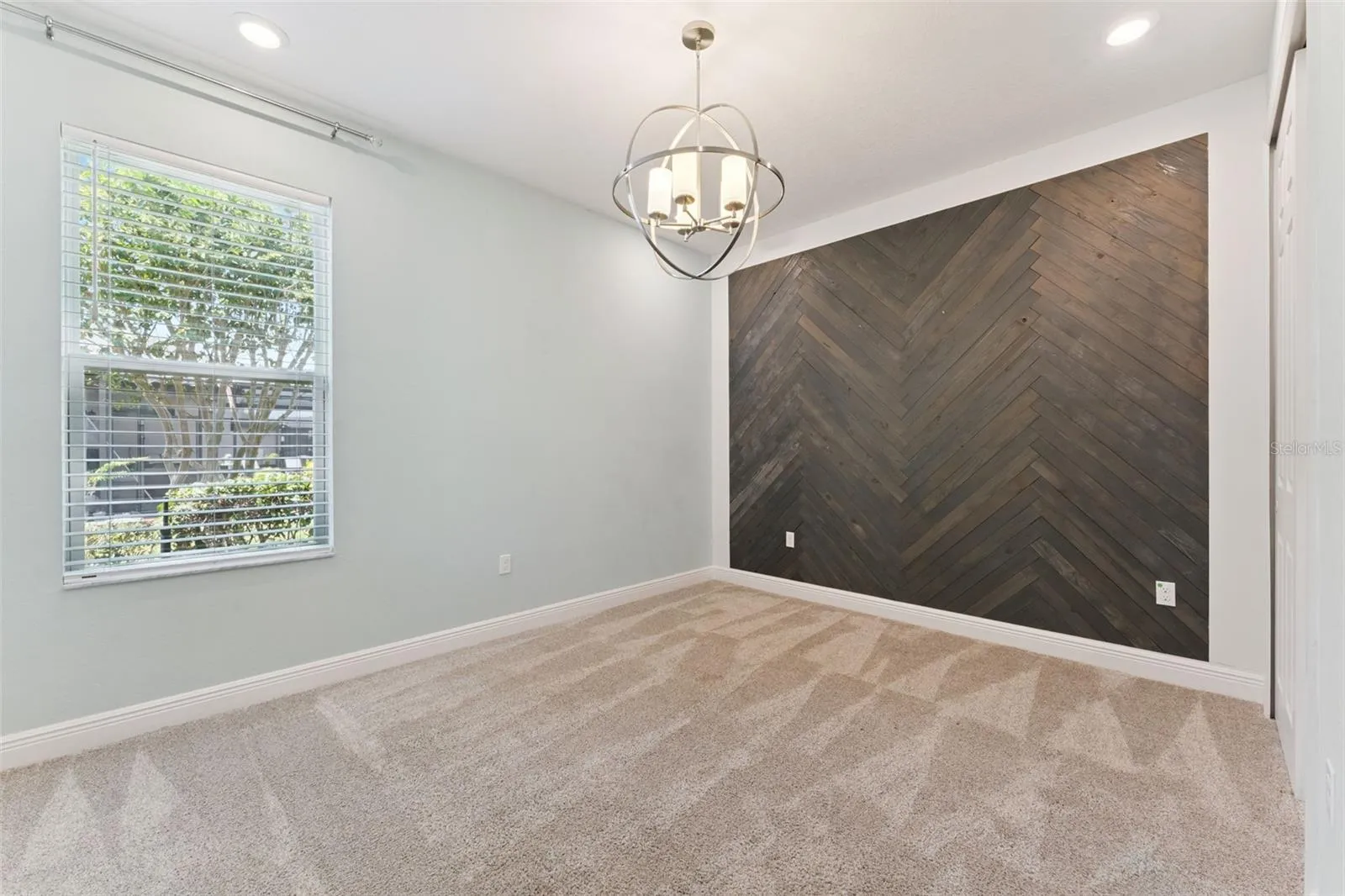 Bedroom 4 / In-law Suite with full bath in hallway.