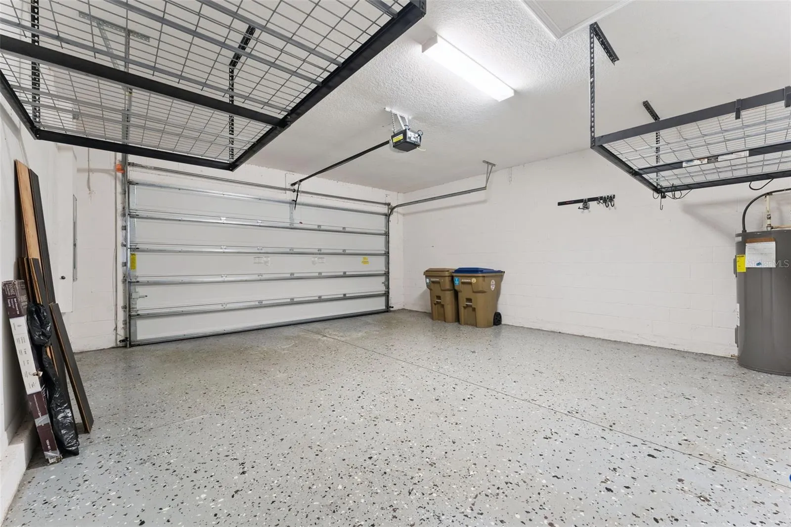 Garage with epoxy flooring.