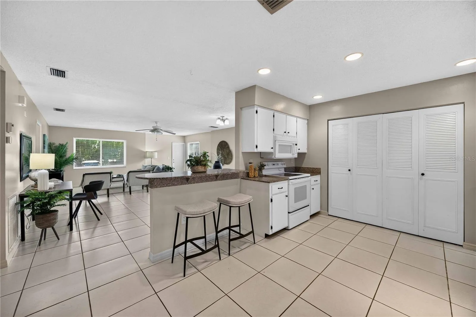 Open kitchen overlooking dining and living room