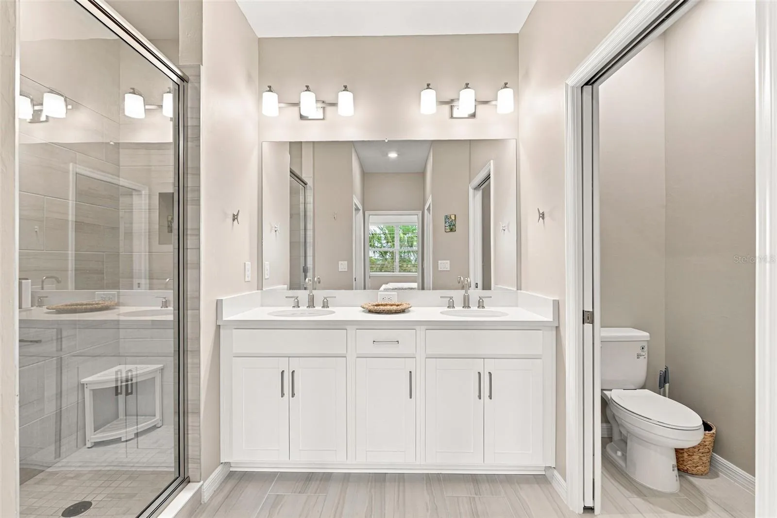 Spacious Primary Ensuite with Dual Sink and Glass-Enclosed Shower
