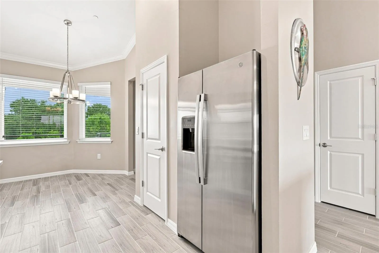 Stainless Steel Appliances with Bright Breakfast Nook