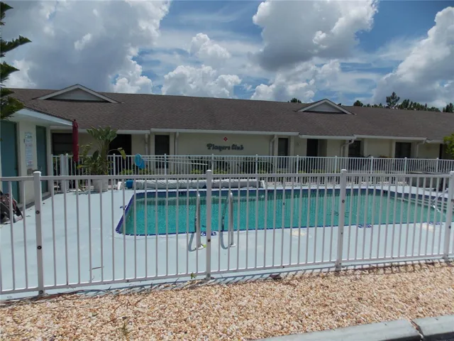 Unit for rent is seen to the rear left