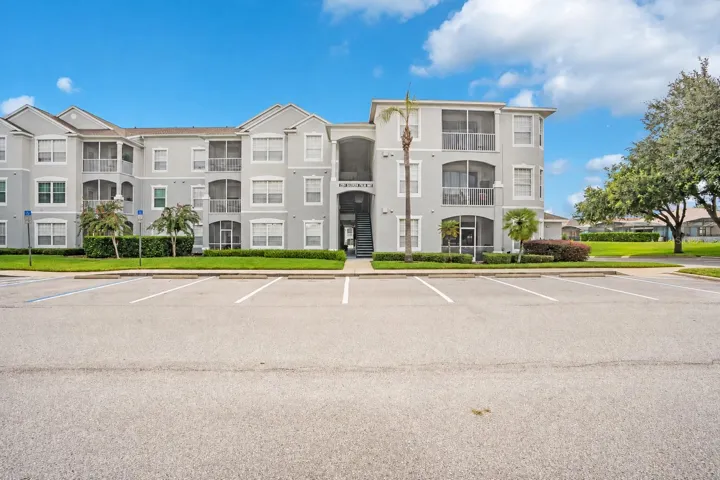 Exterior of the fully furnished first floor condo at 2307 Butterfly Palm Way in Kissimmee, Florida