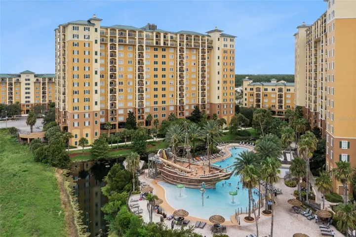 Aerial Resort View | Elevated views overlook the tropical pool complex, landscaped grounds, and surrounding resort towers.