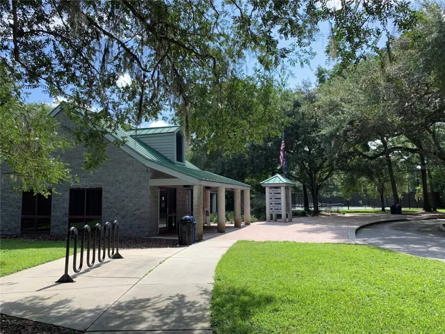 Community center with walking trails, playground, tennis courts and basketball courts.