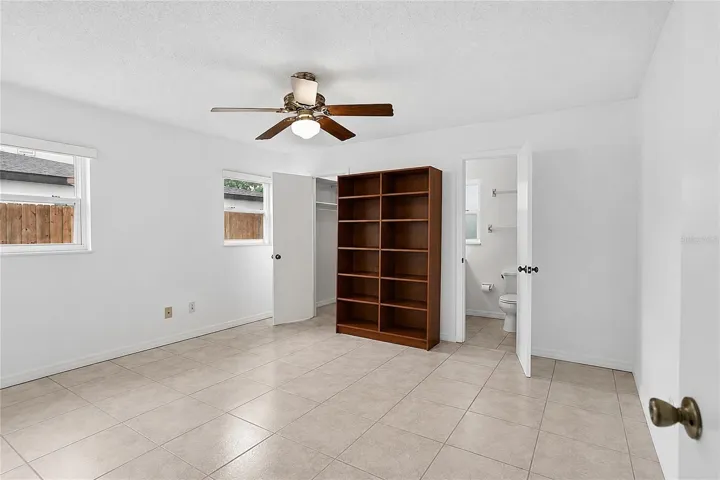 Bedroom 4 with ensuite full bathroom and walk-in closet.