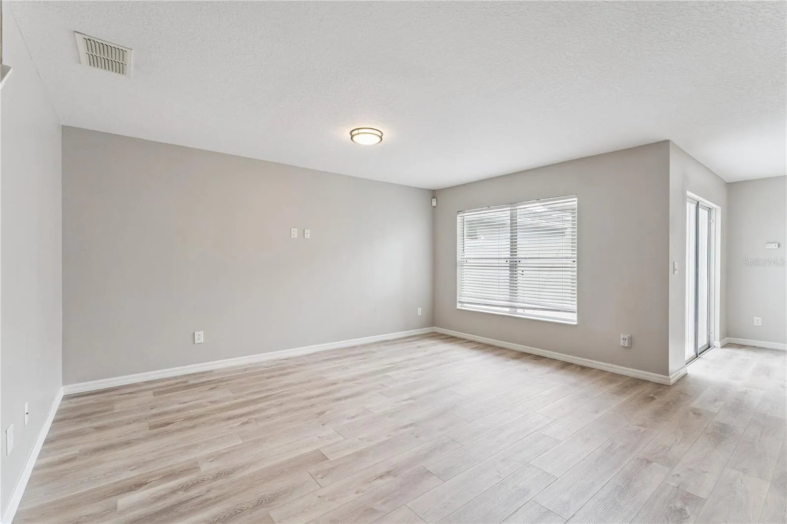 Living room overlooks patio