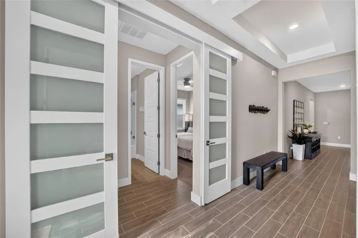 CUSTOM BARN DOORS LEADING TO GUEST SUITES