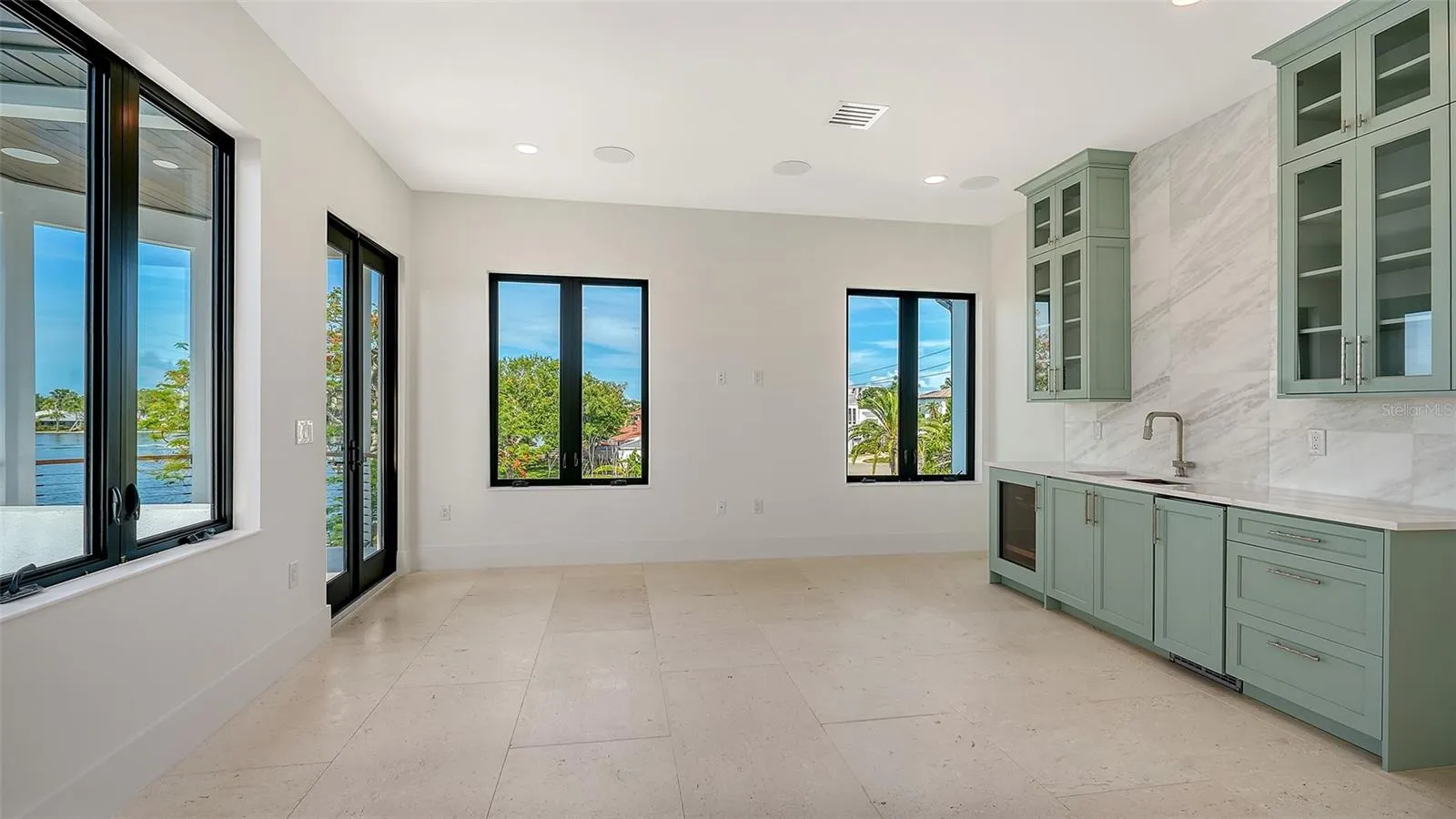 Designed with flexibility in mind, the home features a variety of beautifully appointed spaces that invite lively entertaining, peaceful relaxation, and everything in between.